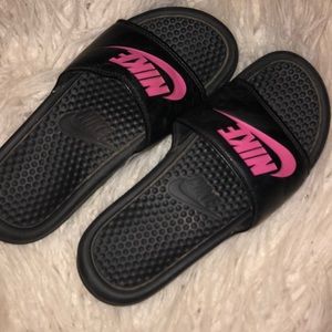 Black & pink Nike slides